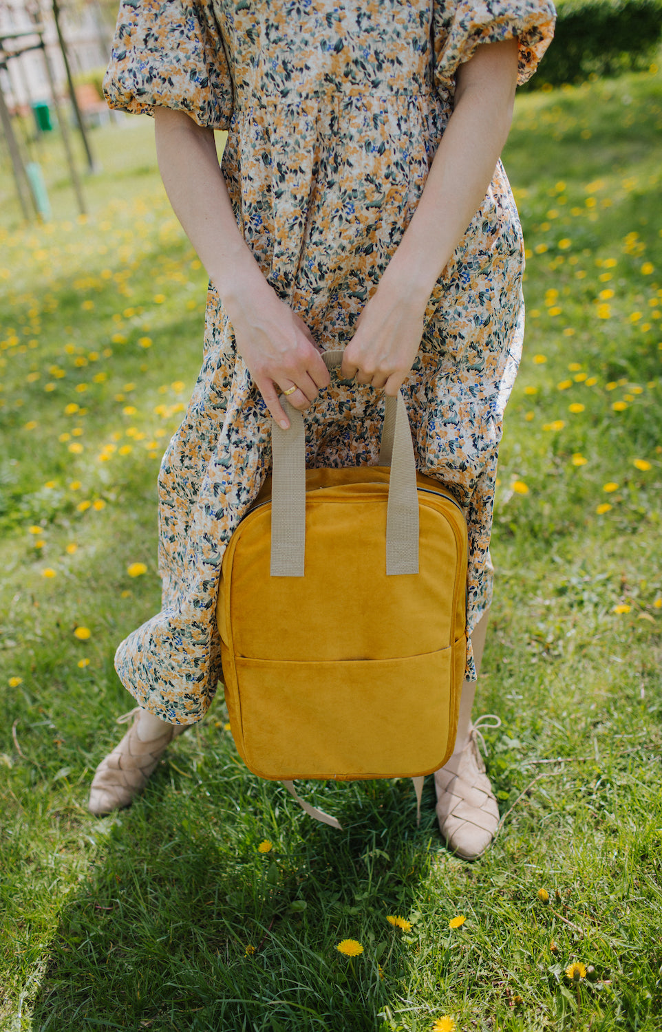 woman with yellow velvet backpack ladies backpack for travel 