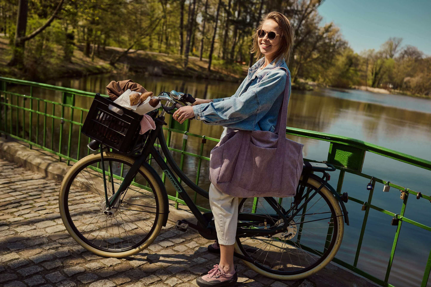 Bettys Home lavender shopper bag. Young woman during her free time on bike with lavender mom bag by Bettys home