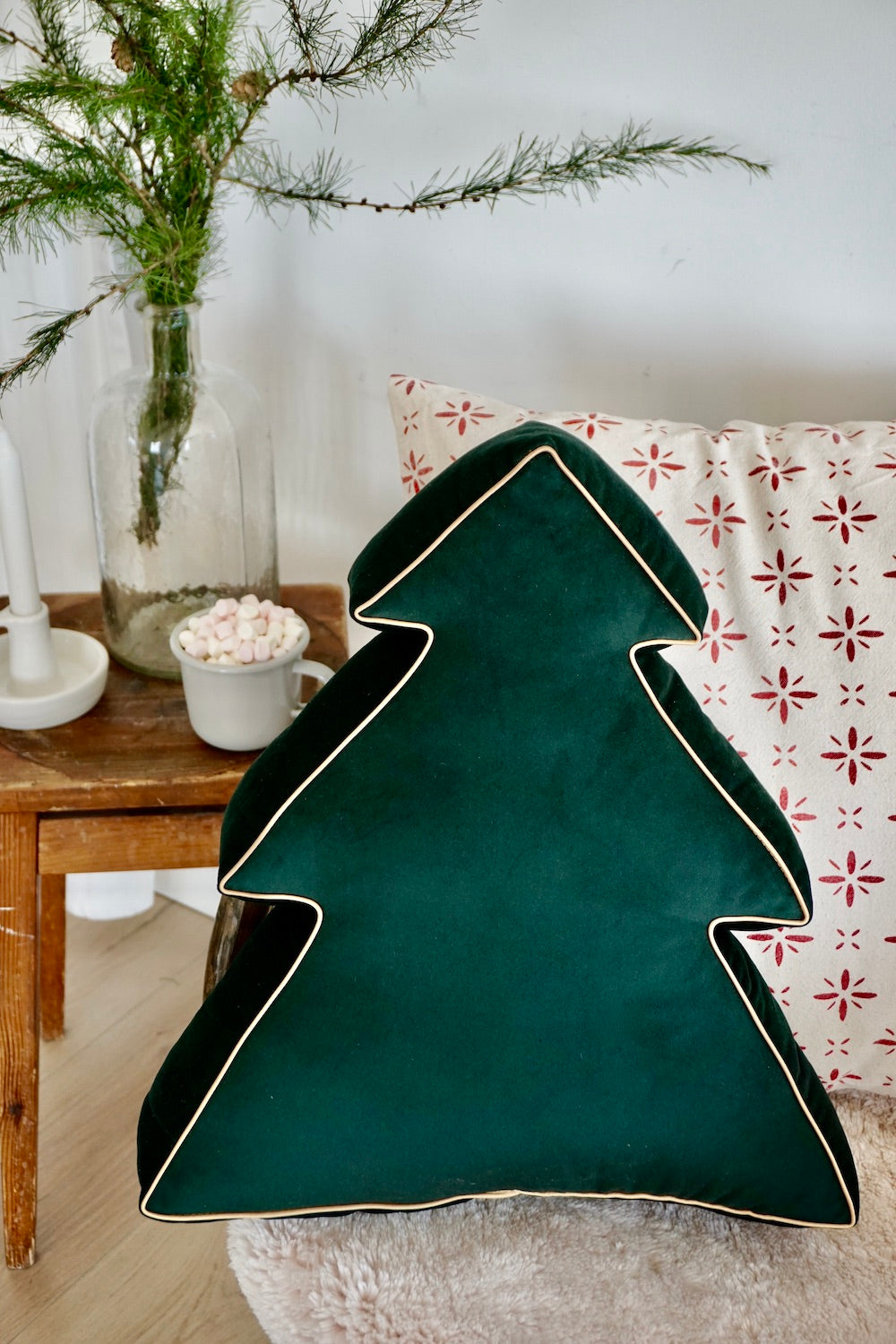 Christmas Tree Cushion Green by Bettys Home on chair in bedroom 