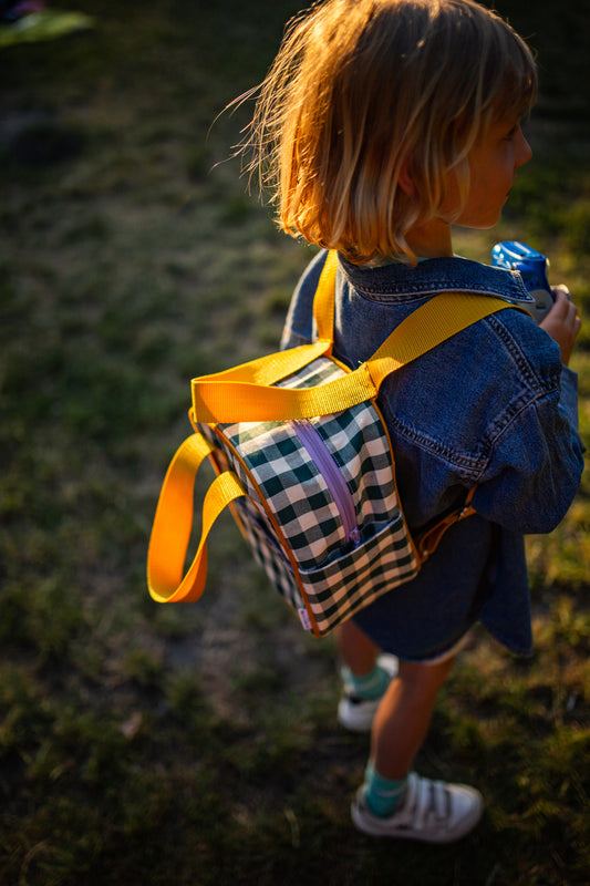 Little boy with green small retro gingham backpack. Checkered green backpack by bettys home