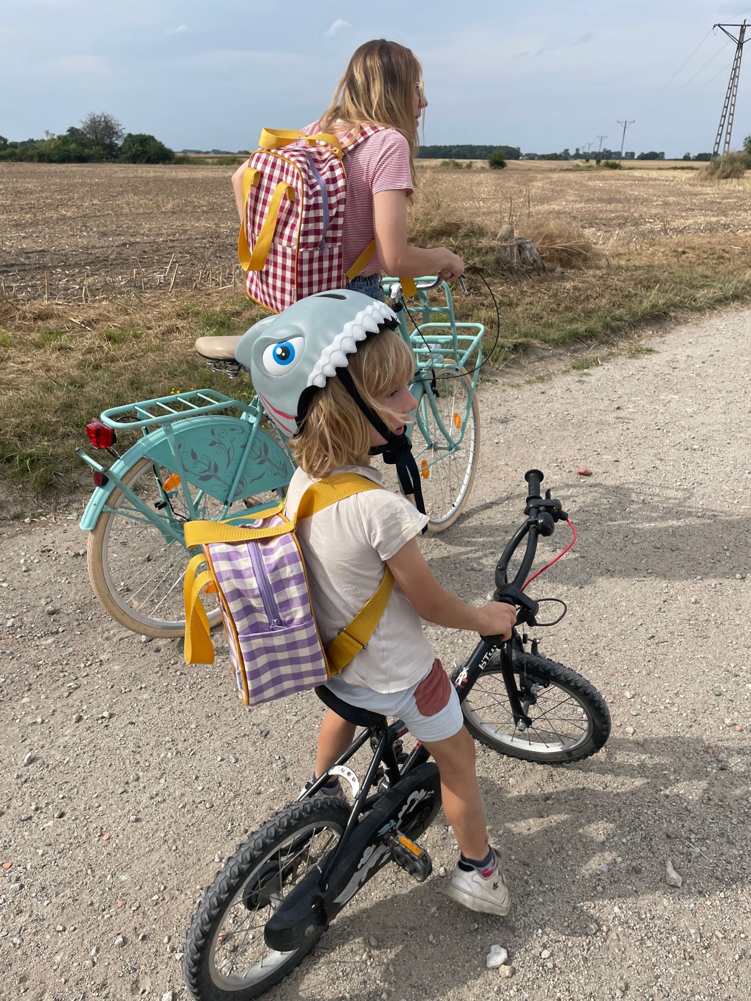 cute boy with mom on bike with lilac gingham backpack. Small Checkered Backpack 