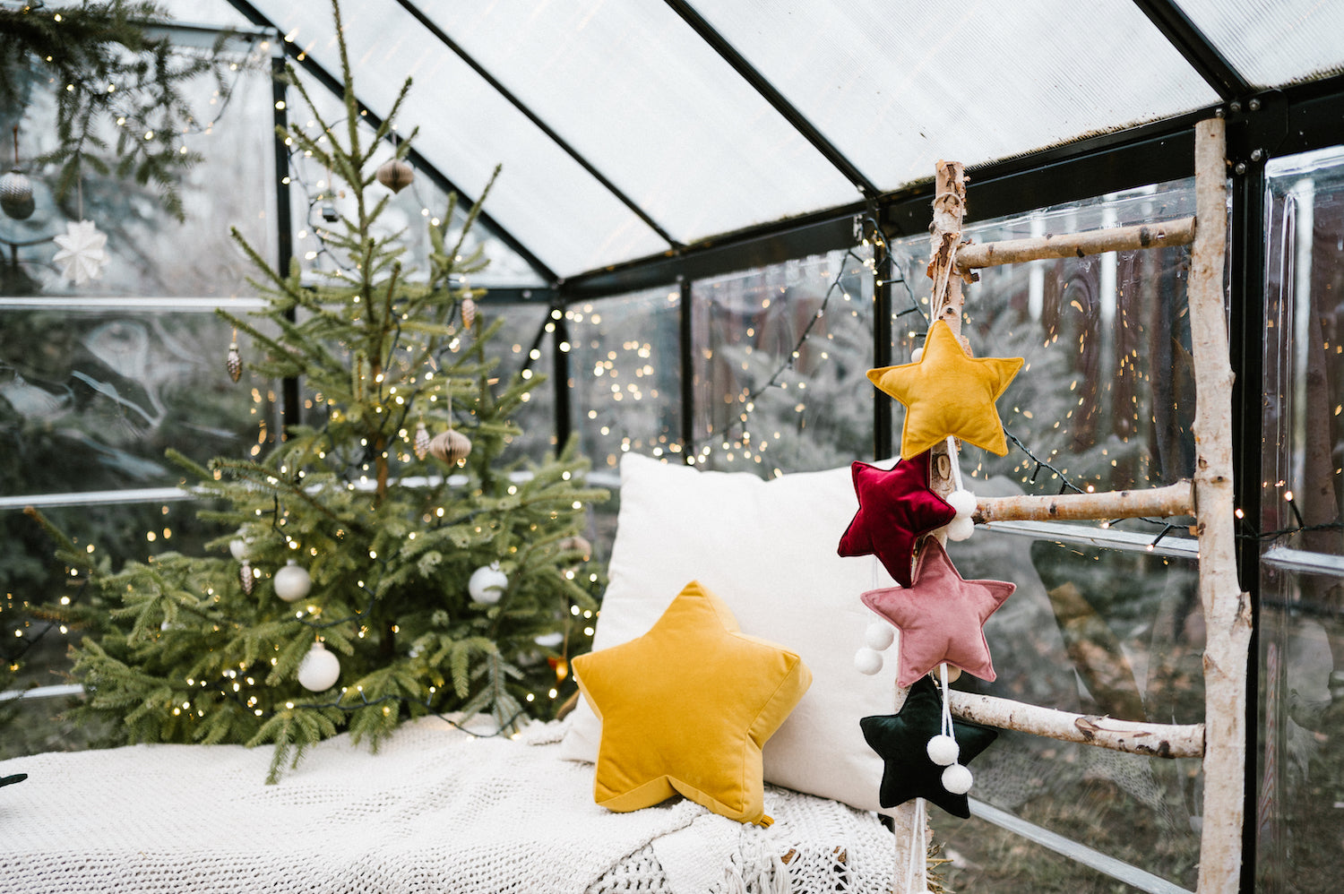 velvet little star pendant yellow with pompoms by bettys home in greenhouse hanging over chair