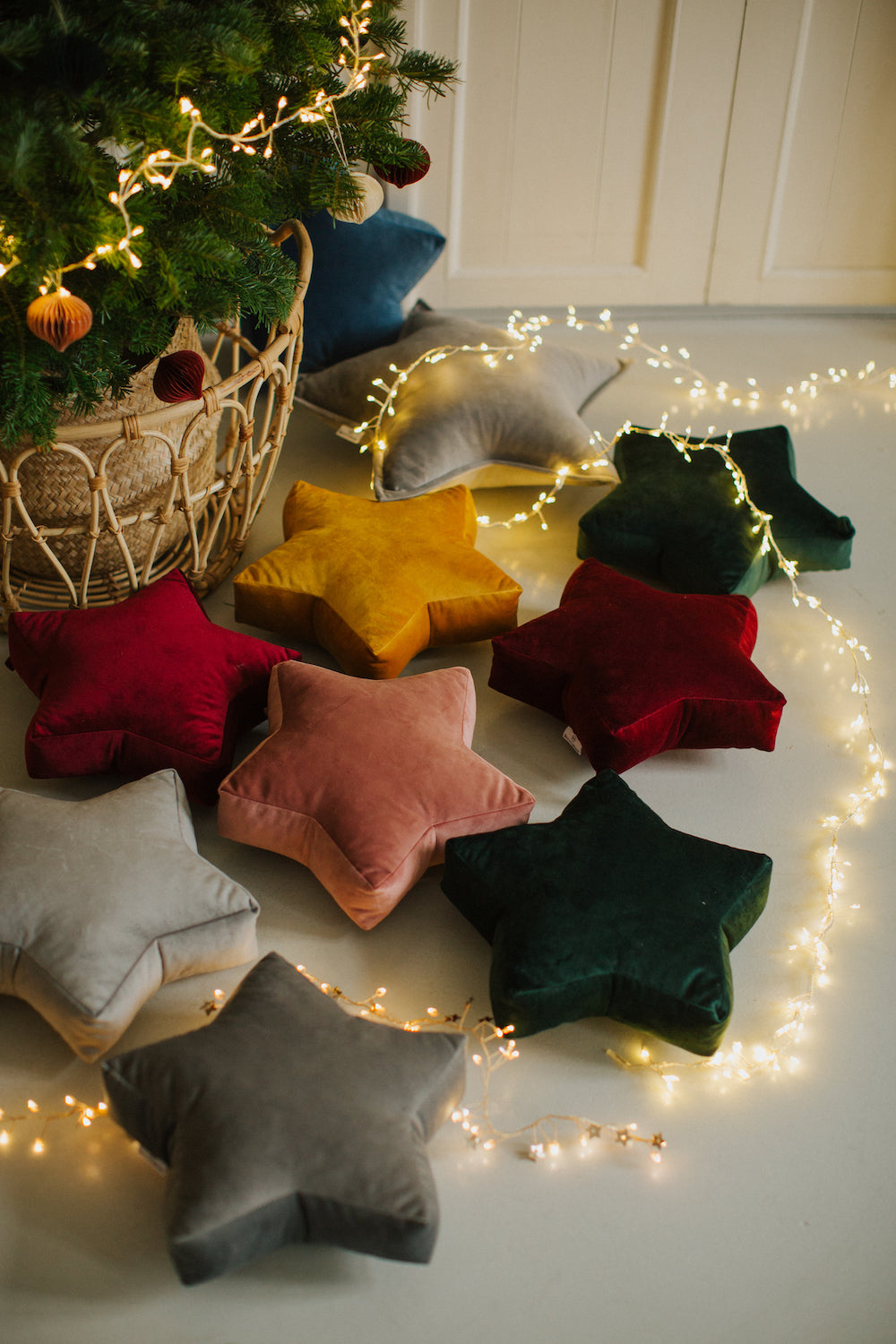 Small star cushion green by bettys home. Kids room wall decoration with other star cushion under christmas tree