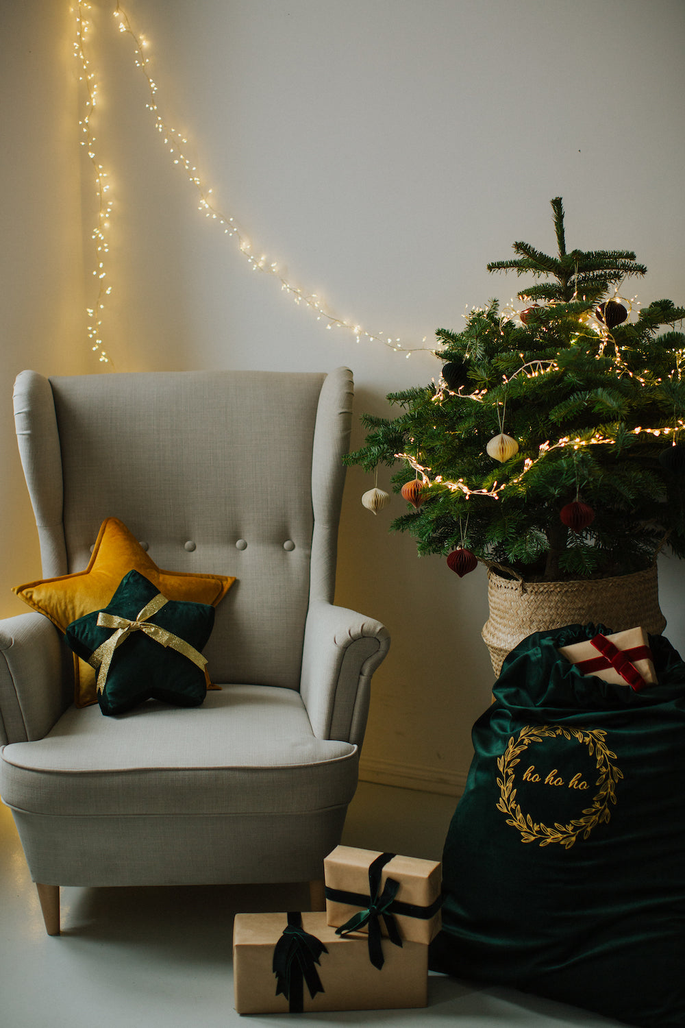Small star cushion green by bettys home. Kids room wall decoration on chair next to Christmas tree and christmas sack 